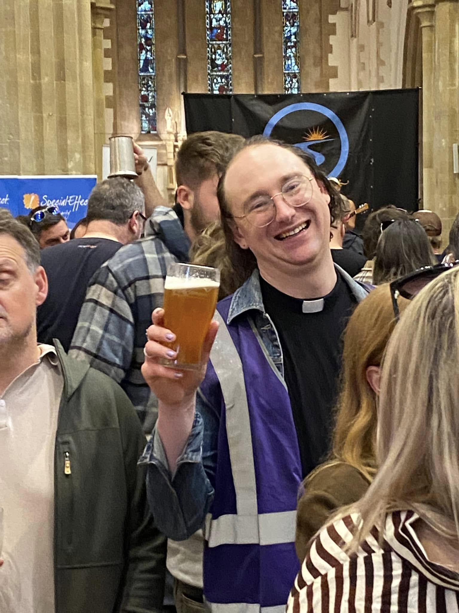A chaplain enjoying a beer at the Witney Beer Festival